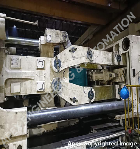 Molding machine repair service technician fixing injection molding machine